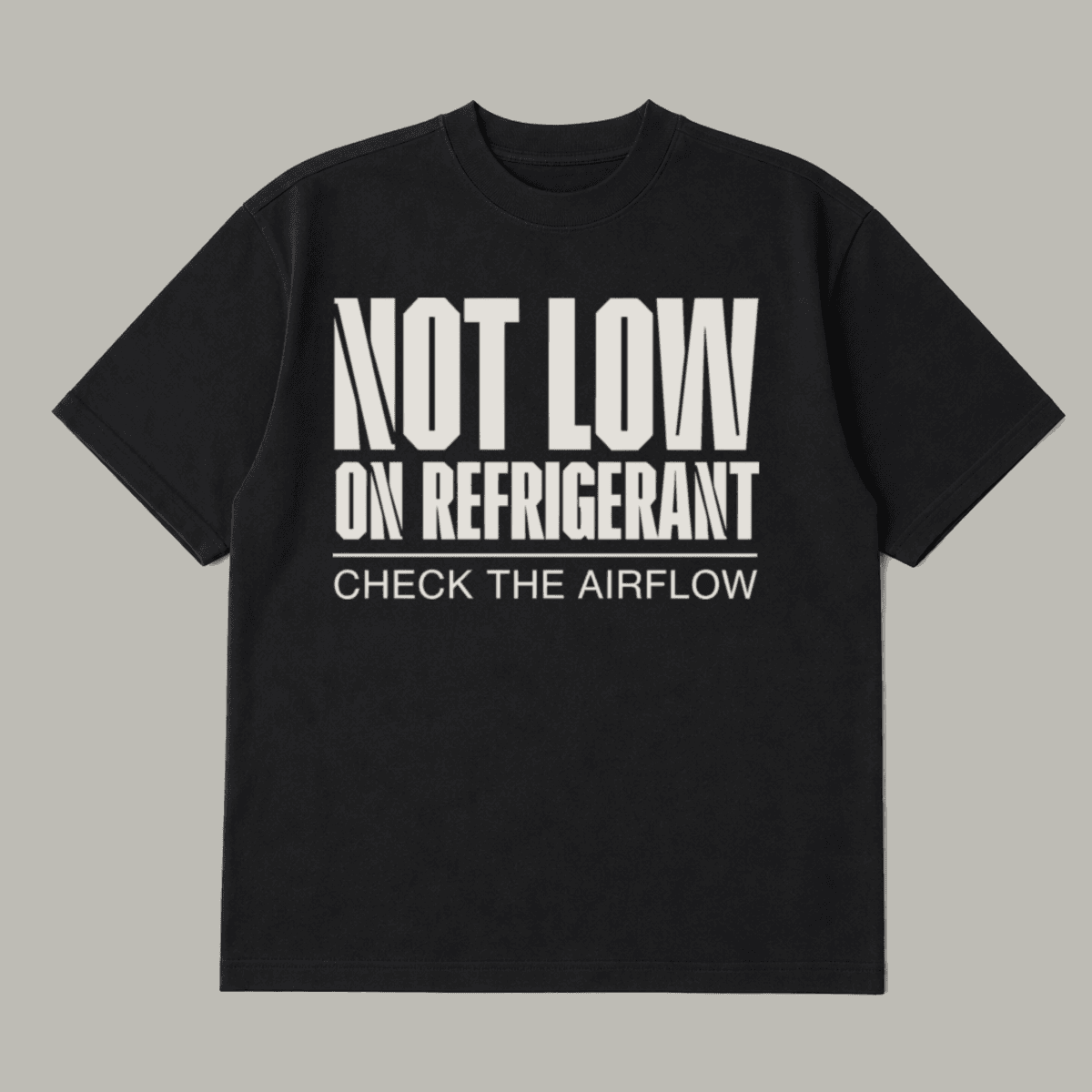 NOT LOW ON REFRIGERANT · CHECK THE AIRFLOW printed on a black heavyweight tee